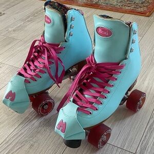 Moxi Women's Teal Roller Skates with Pink Accents